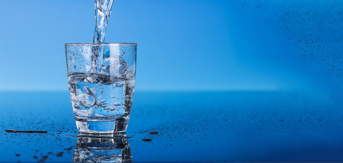 Water pouring in glass