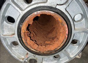 Heavily corroded pipe.